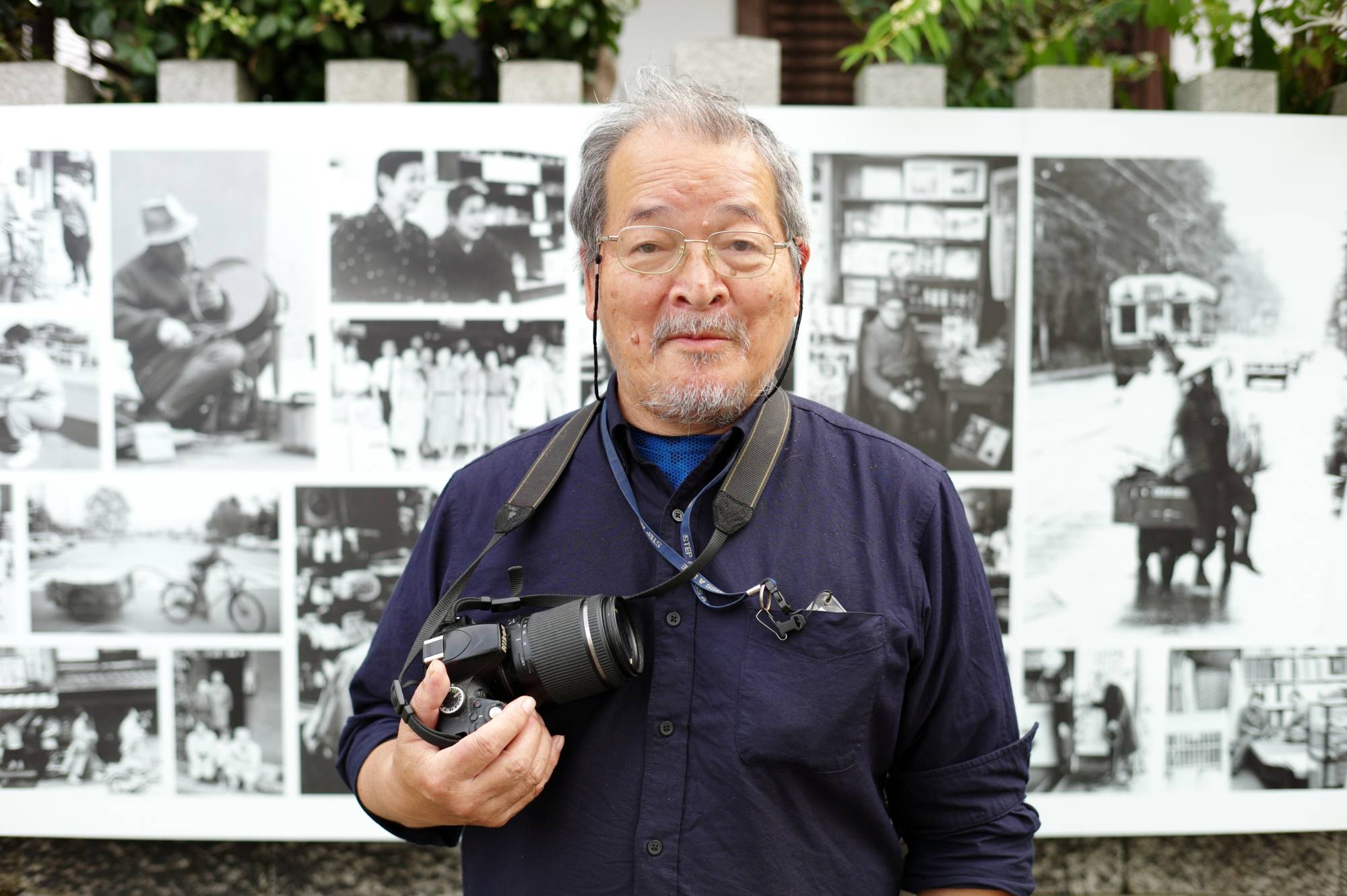 Capturing the past: Fusayoshi Kai, whose photographs are on display along the Kamo River, has been documenting life along the river for more than four decades. | RYUSEI TAKAHASHI 
