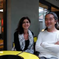 Teamwork: Lucille Reyboz (left) and Yusuke Nakanishi, co-founders and co-directors of Kyotographie, sit outside Delta, the art festival’s first-ever permanent space. | RYUSEI TAKAHASHI
