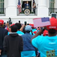 U.S. President Donald Trump speaks from the South Portico of the White House during a rally on Saturday. | AFP-JIJI