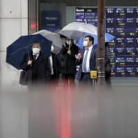 A surge in the prices of shares in Japan’s trading houses triggered by Warren Buffett’s $6 billion investment is already fading. | BLOOMBERG
