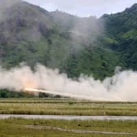 U.S. military forces fire a High Mobility Artillery Rocket System rocket during a live fire amphibious landing exercise in the Philippines in 2016. | REUTERS 