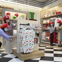 Goods inspired by characters from the Super Mario Bros. game series are sold at the Mario Cafe & Store at Universal Studios Japan in Osaka. | KYODO