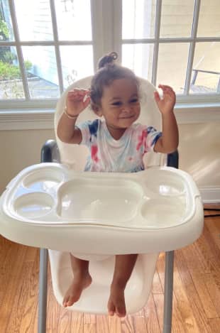 Sloane Stephens, 17 months old, interacts with the online Songs for Seeds program via Zoom at her home in Connecticut. Without preschool and playgroups, young children around the world are missing out on important educational opportunities. | MAYA SHARAN-STEPHENS / VIA THE NEW YORK TIMES
