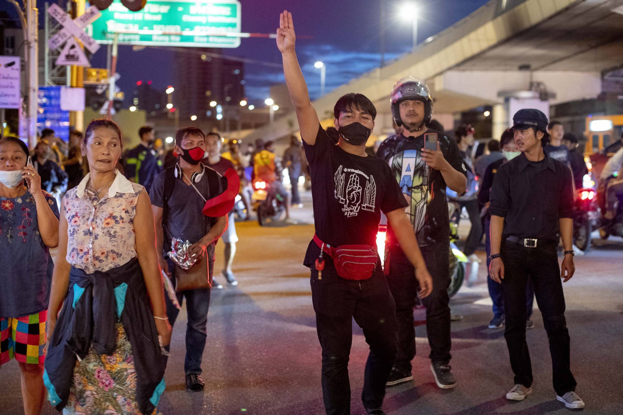 A small group of pro-democracy protesters near the Government House in Bangkok on Thursday. | AP