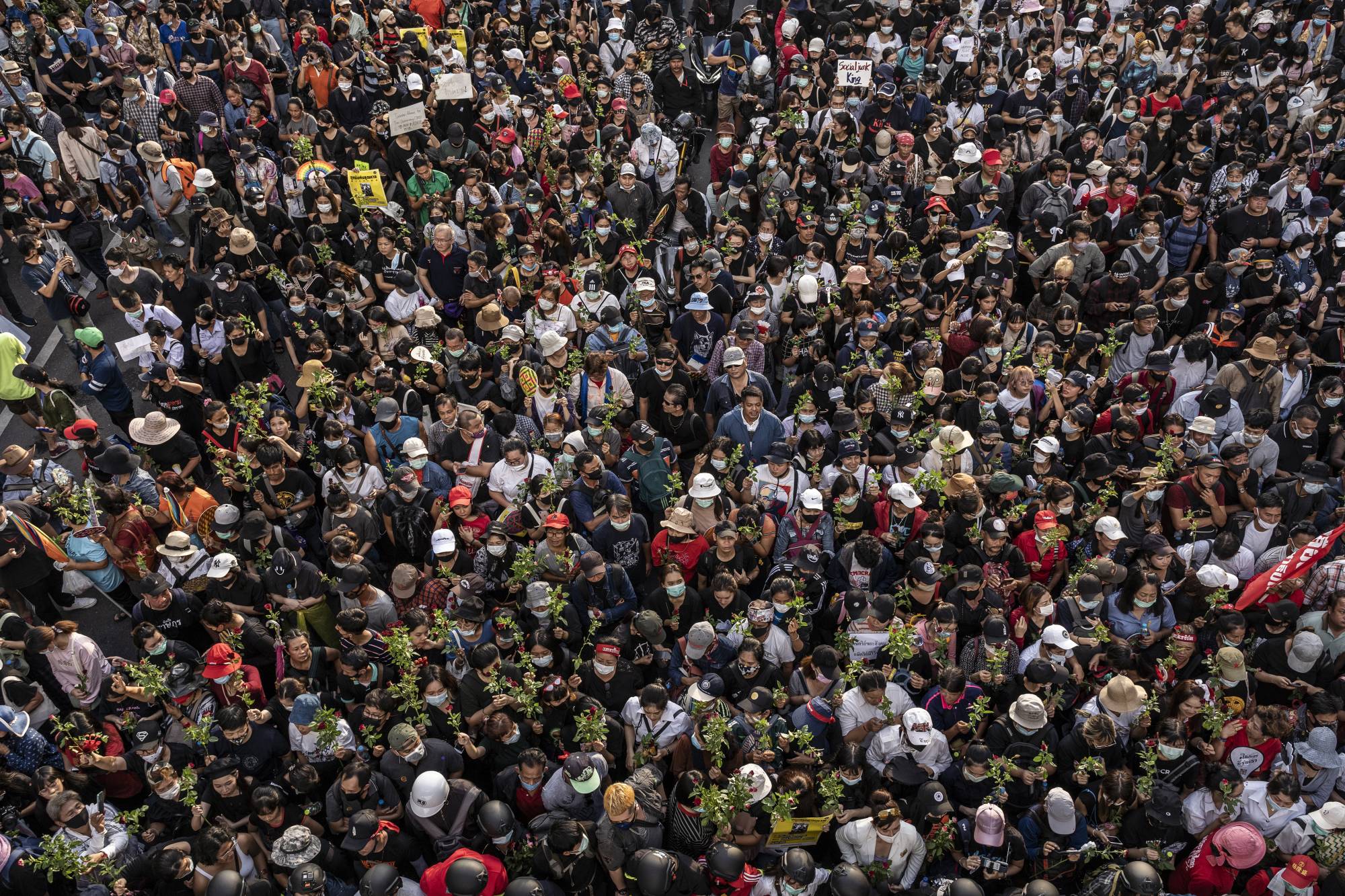 Pro-democracy protesters gathered by the thousands in Bangkok on Wednesday. | Adam Dean / The New York Times