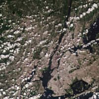 New York City’s 900 kilometers of shoreline in August 2019 as seen by the Copernicus Sentinel-2 satellite | EUROPEAN SPACE AGENCY / VIA BLOOMBERG 