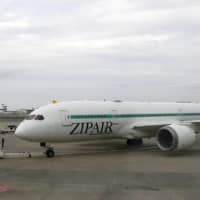 A Zipair Tokyo Inc. airplane prepares to depart from Narita airport on Friday. | KYODO