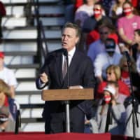 Sen. David Perdue speaks during a campaign rally for President Donald Trump at Middle Georgia Regional Airport on in Macon, Georgia. | AP