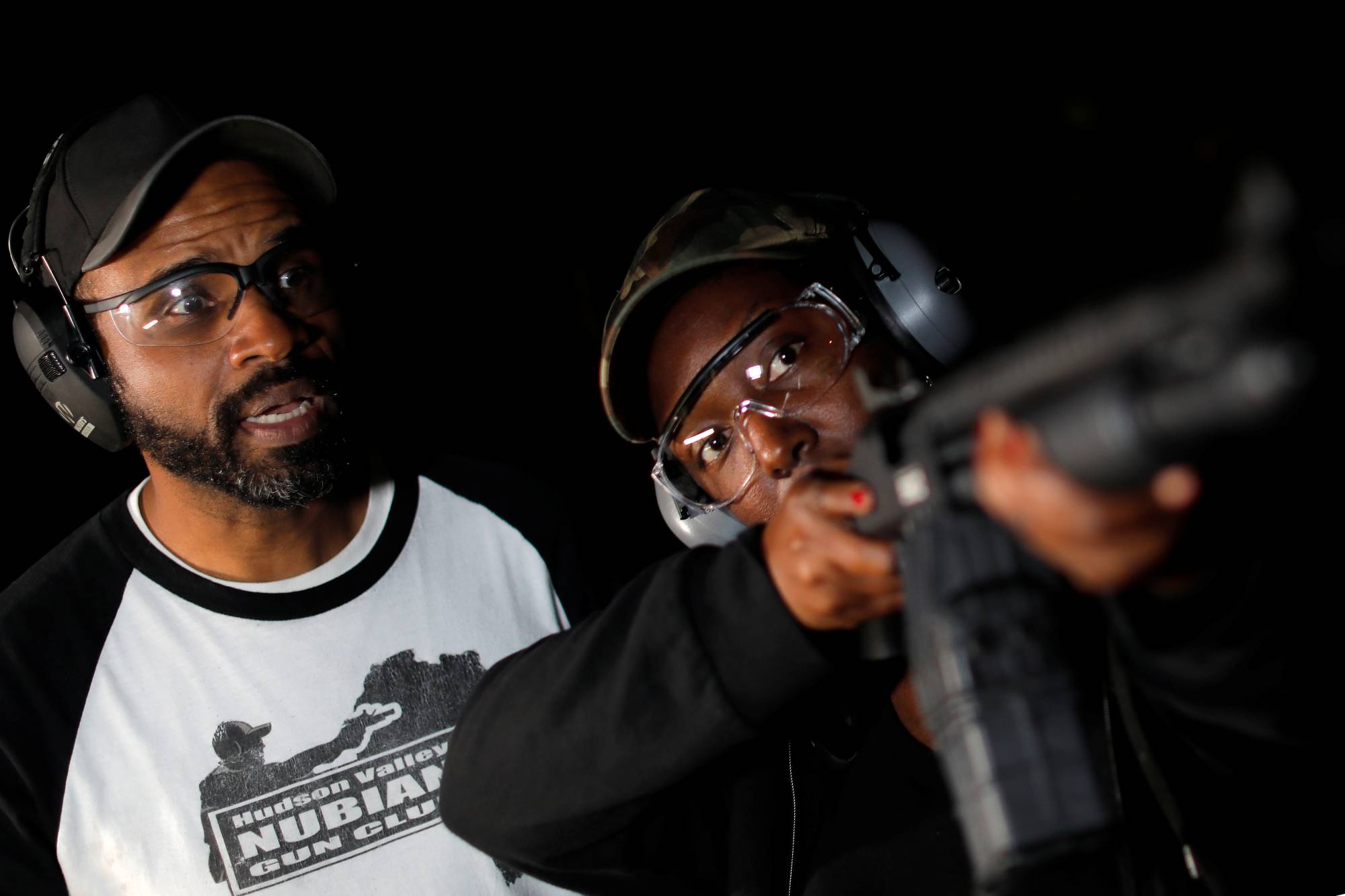 Andreyah Garland, a 44-year-old single mother of three daughters and a new member of a gun club, points her shotgun as she undergoes a gun training session with club founder Damon Finch in Newburgh, New York, earlier this month.  | REUTERS
