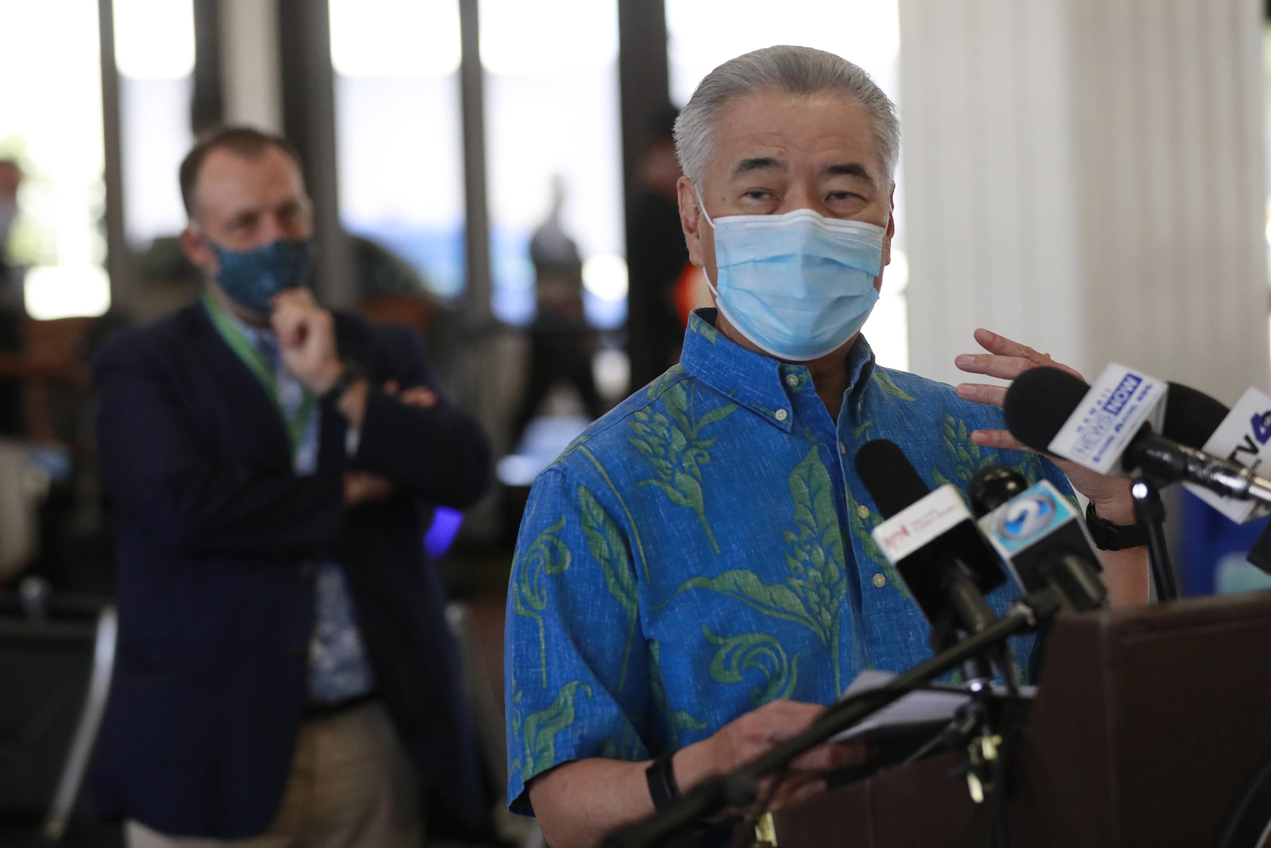 Hawaii Gov. David Ige speaks at a news conference at the Daniel K. Inouye International Airport, last Thursday in Honolulu. A new travel testing program that will allow visitors who test negative for COVID-19 to come to Hawaii and avoid two weeks of mandatory quarantine has recently gone into effect. | AP