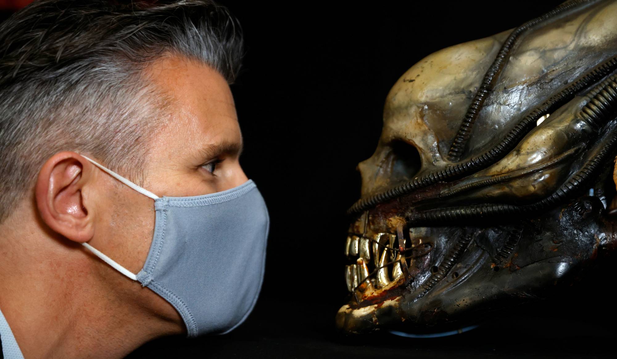 Stephen Lane with a special effects mechanical head from the film 