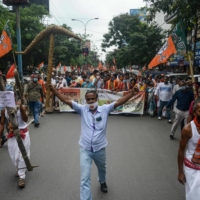 Bharatiya Janata Party supporters take part in a rally backing the agriculture bills of Indian Prime Minister Narendra Modi\'s government on Oct. 3. | AFP-JIJI