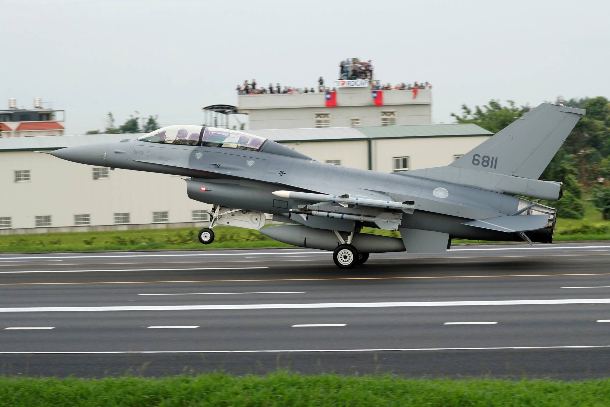 A Republic of China Air Force F-16V fighter jet lands on a highway used as an emergency runway during the Han Kuang military exercise simulating China's People's Liberation Army invading the island, in Changhua, Taiwan, in May last year. | REUTERS