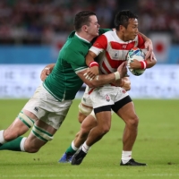 Japan\'s Yutaka Nagare is tackled by Ireland\'s James Ryan during their match at the Rugby World Cup on Sept. 28, 2019. | REUTERS