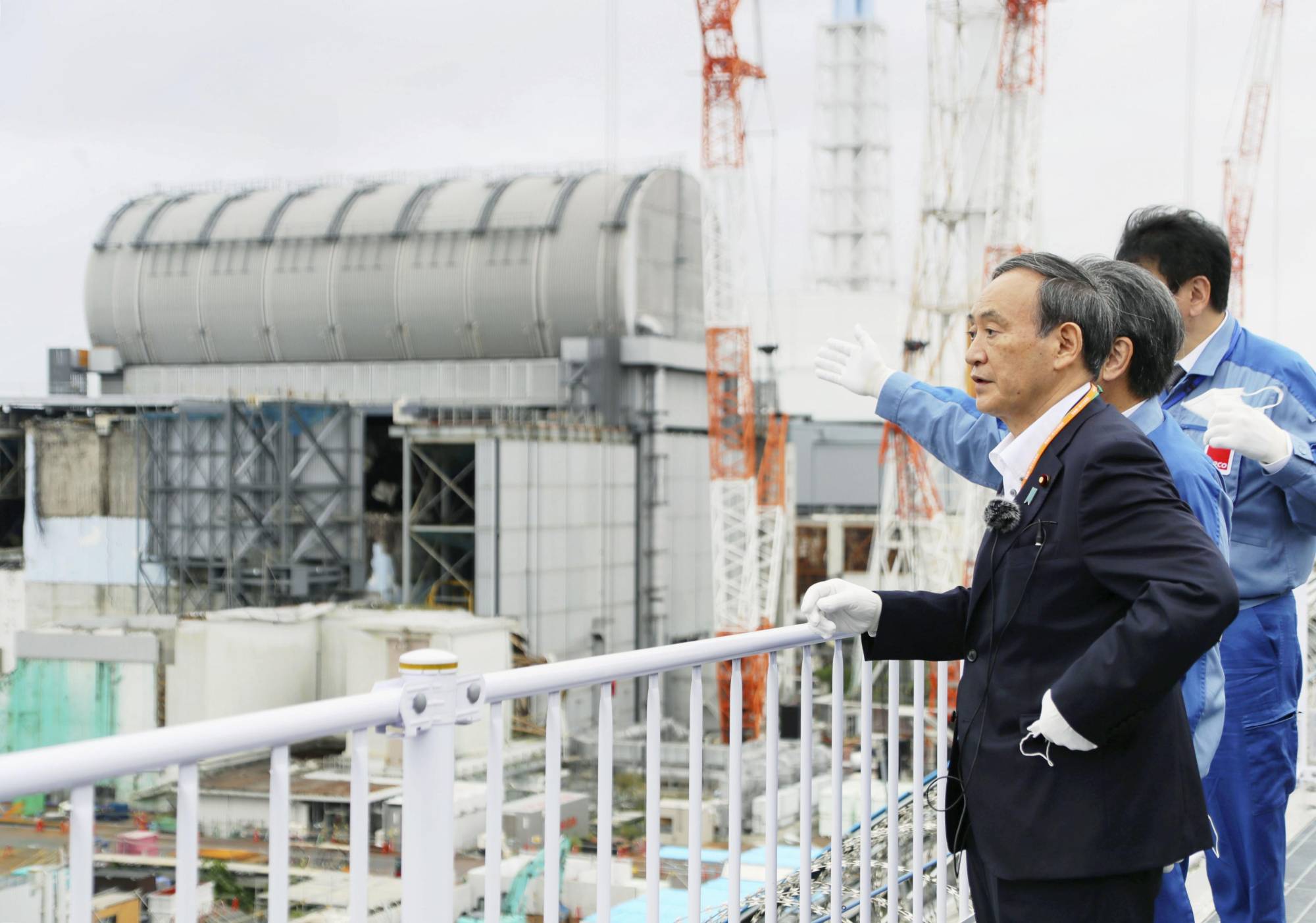Prime Minister Yoshide Suga visited the Fukushima No. 1 nuclear power plant on Sept. 26, a month before vowing to reduce Japan's carbon emissions to zero by 2050. | POOL / VIA KYODO