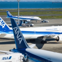 All Nippon Airways has signed up for jet fuel made from renewable materials in Singapore. | BLOOMBERG