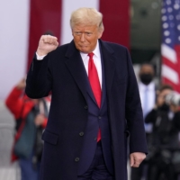 President Donald Trump arrives for a campaign rally in Martinsburg, Pennsylvania, on Monday. | AP