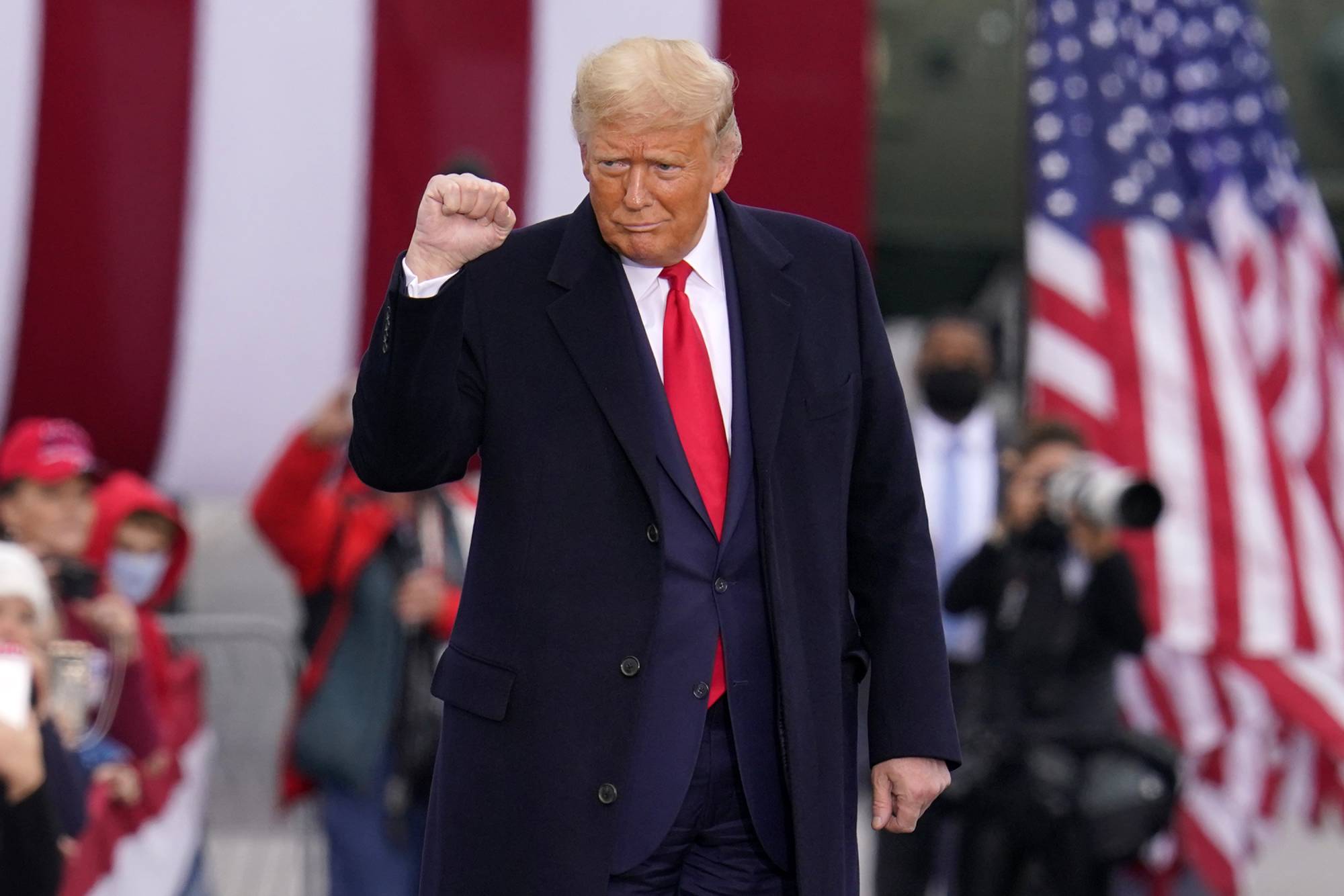 President Donald Trump arrives for a campaign rally in Martinsburg, Pennsylvania, on Monday. | AP