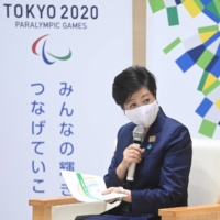 Tokyo Gov. Yuriko Koike speaks during her meeting with World Athletics president Sebastian Coe at the Tokyo Metropolitan Government building on Oct. 8. | AFP-JIJI