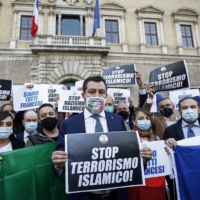 Italian protesters hold a demonstration in front of the French Embassy in Rome after an attacker armed with a knife killed three people at a church in Nice, France, on Thursday.  | LAPRESSE / VIA AP