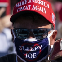 In many countries, elections often come with a risk of bloodshed owing to such factors as extreme political polarization, winner-take-all stakes, a proliferation of weapons and flawed electoral processes.These risk factors are all in some measure present in the U.S. today.
 | AP