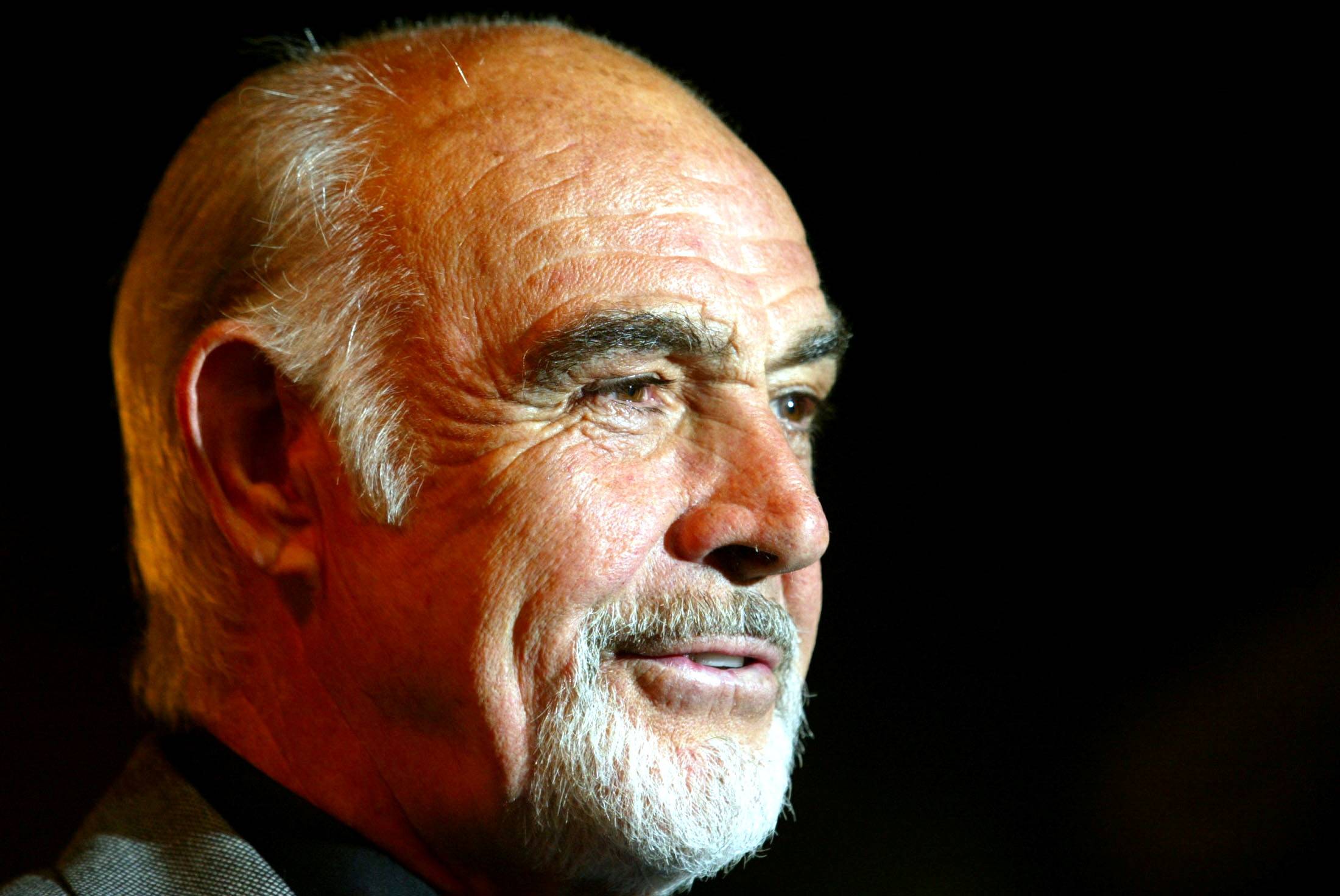 Scottish actor Sean Connery arrives for the premiere of 'The League of Extraordinary Gentlemen' in London in September 2003. Best known for playing fictional spy James Bond in seven films, Connery has died at the age of 90, his family said Saturday. | REUTERS