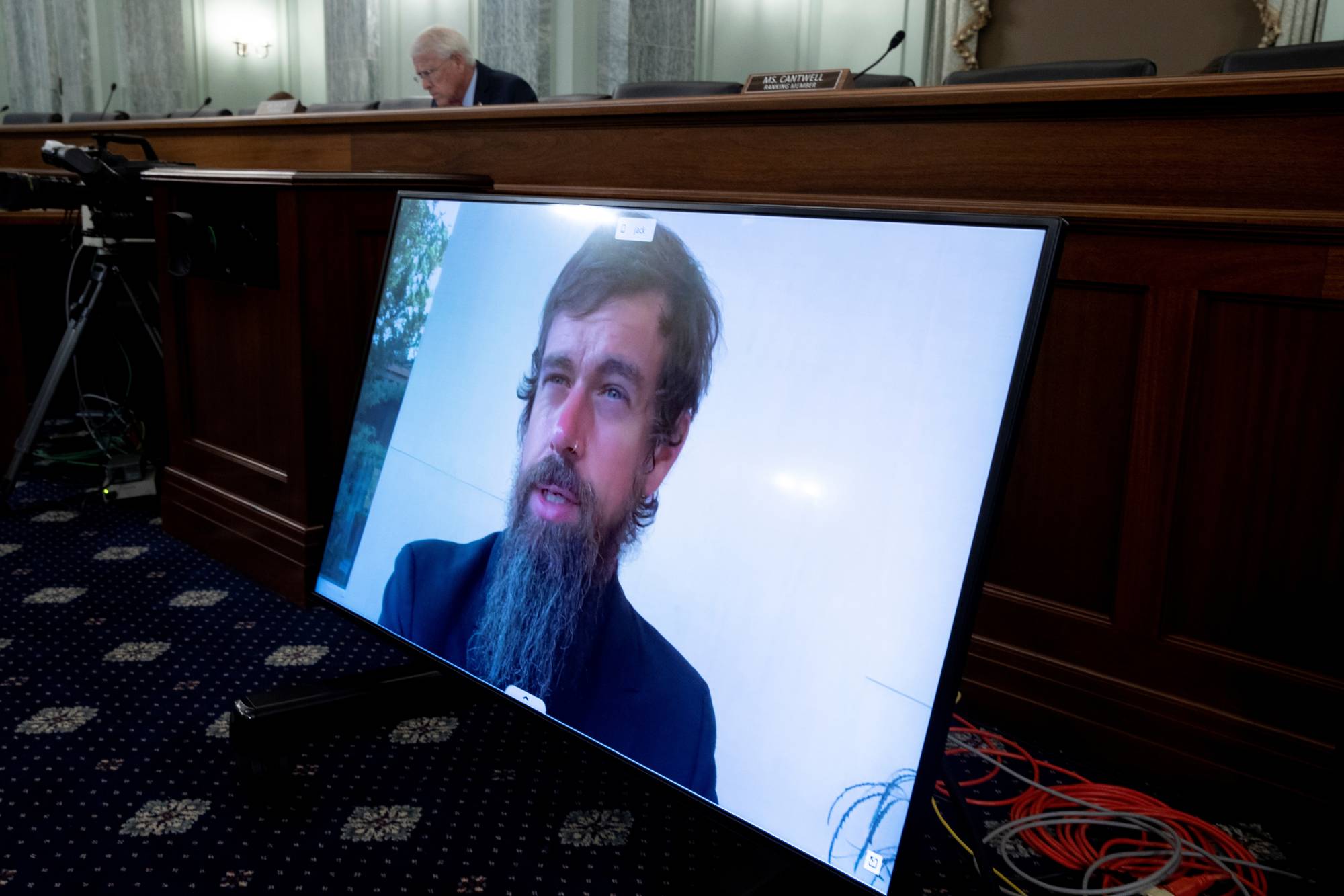 Twitter CEO Jack Dorsey testifies remotely during a Senate committee hearing on whether to amend Section 230 of the Communications Decency Act, on Capitol Hill on Wednesday. | POOL VIA REUTERS