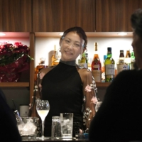 Minami Akizuki, 27, met strong opposition from people around her when she opened a new bar in Fukuoka\'s Nakasu district in the middle of the pandemic. | NISHINIPPON SHIMBUN
