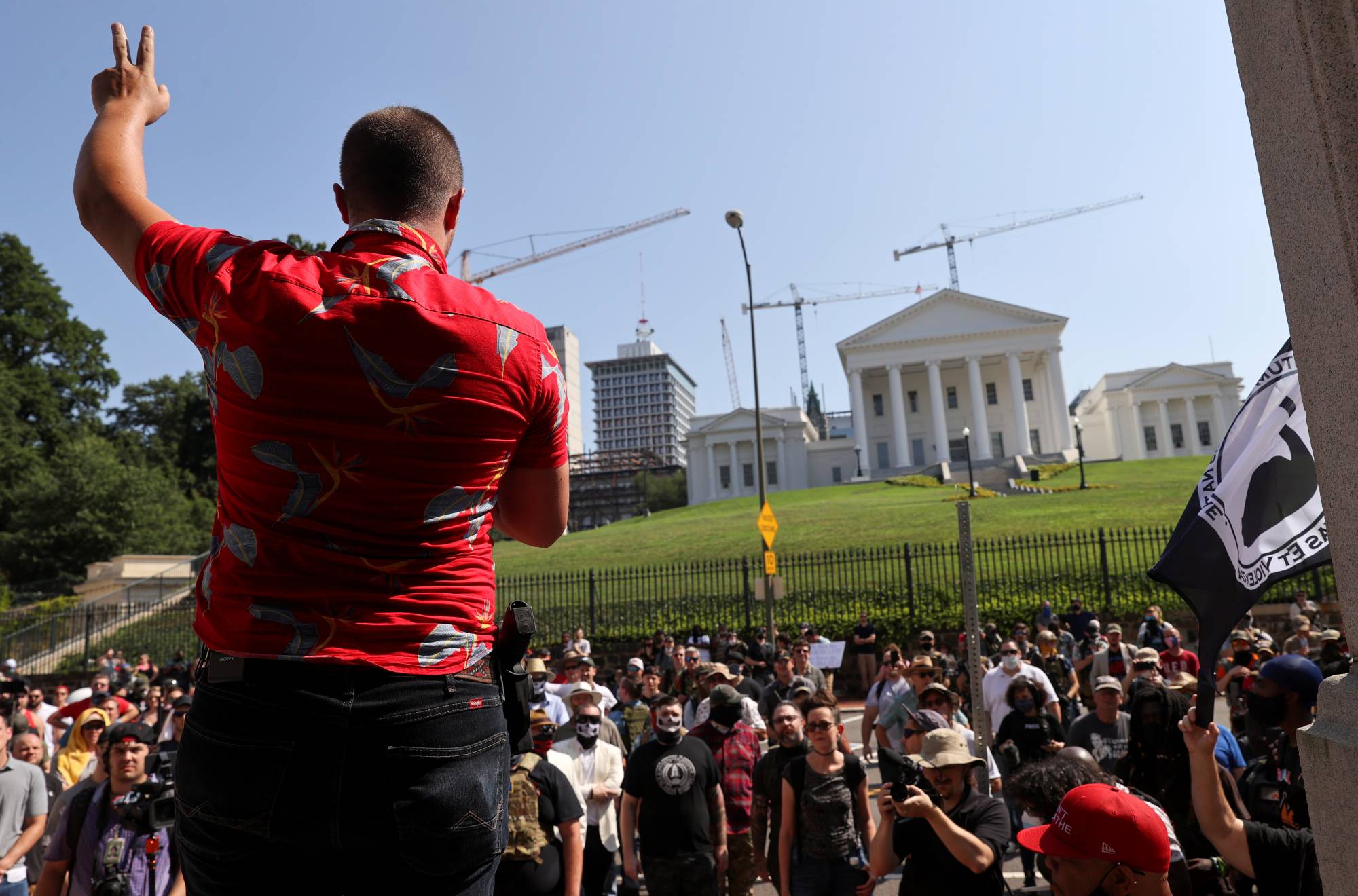 Protest leader Mike Dunn gestures as he speaks during a rally in Richmond, Virginia, in July. | REUTERS 