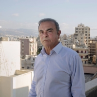 Carlos Ghosn, former chief executive officer of Nissan Motor Co., poses for a photograph in Beirut in August. | BLOOMBERG