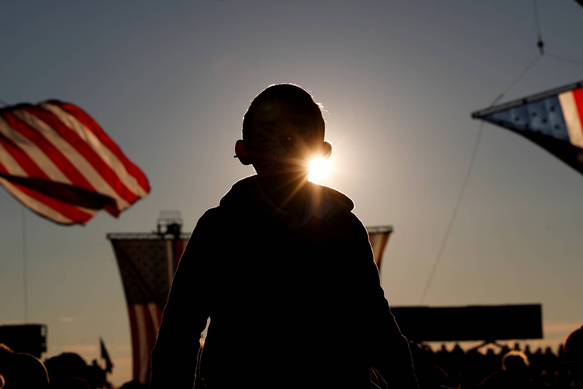 A child attends a campaign rally for U.S. President Donald Trump in Butler, Pennsylvania, on Saturday. | REUTERS