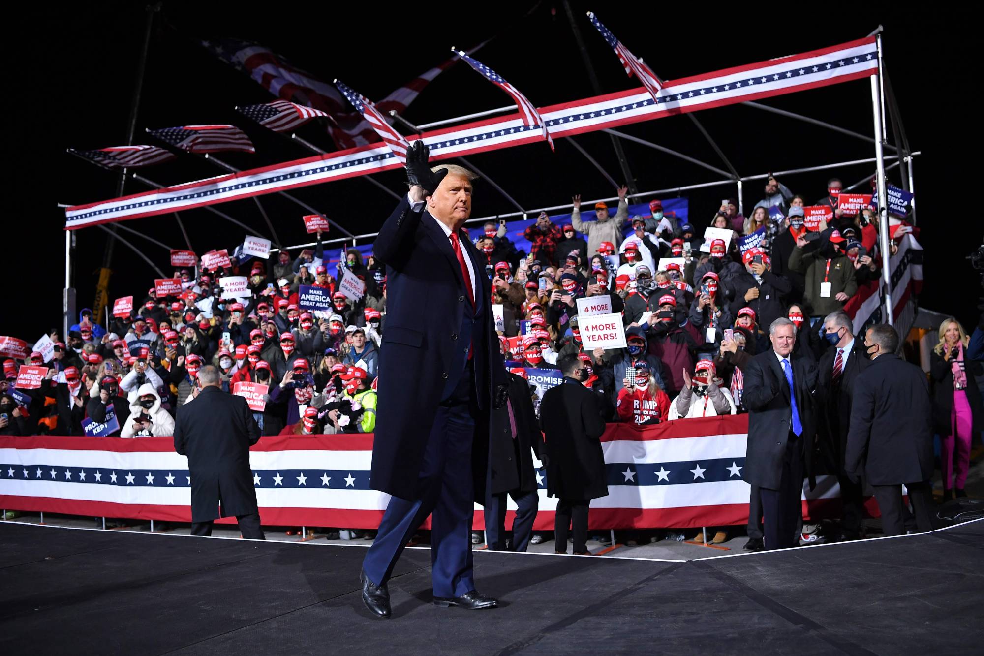 U.S. President Donald Trump waves as he departs a rally at Williamsport Regional Airport in Montoursville, Pennsylvania, on Saturday. | AFP-JIJI