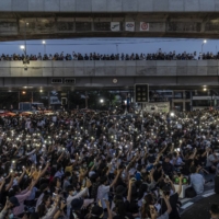 Protesters rally for democratic changes in Bangkok on Oct. 19. | ADAM DEAN / THE NEW YORK TIMES