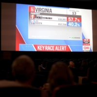 People attend an election watch party in Columbus, Ohio, on Tuesday. | REUTERS