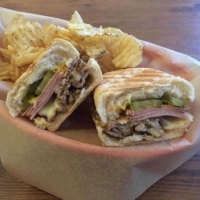 Cuban flair: Harry Stanwood adds house-cured pork belly to his Cubano sandwich for a twist on a fan favorite. | COURTESY OF HARRY’S SANDWICH COMPANY
