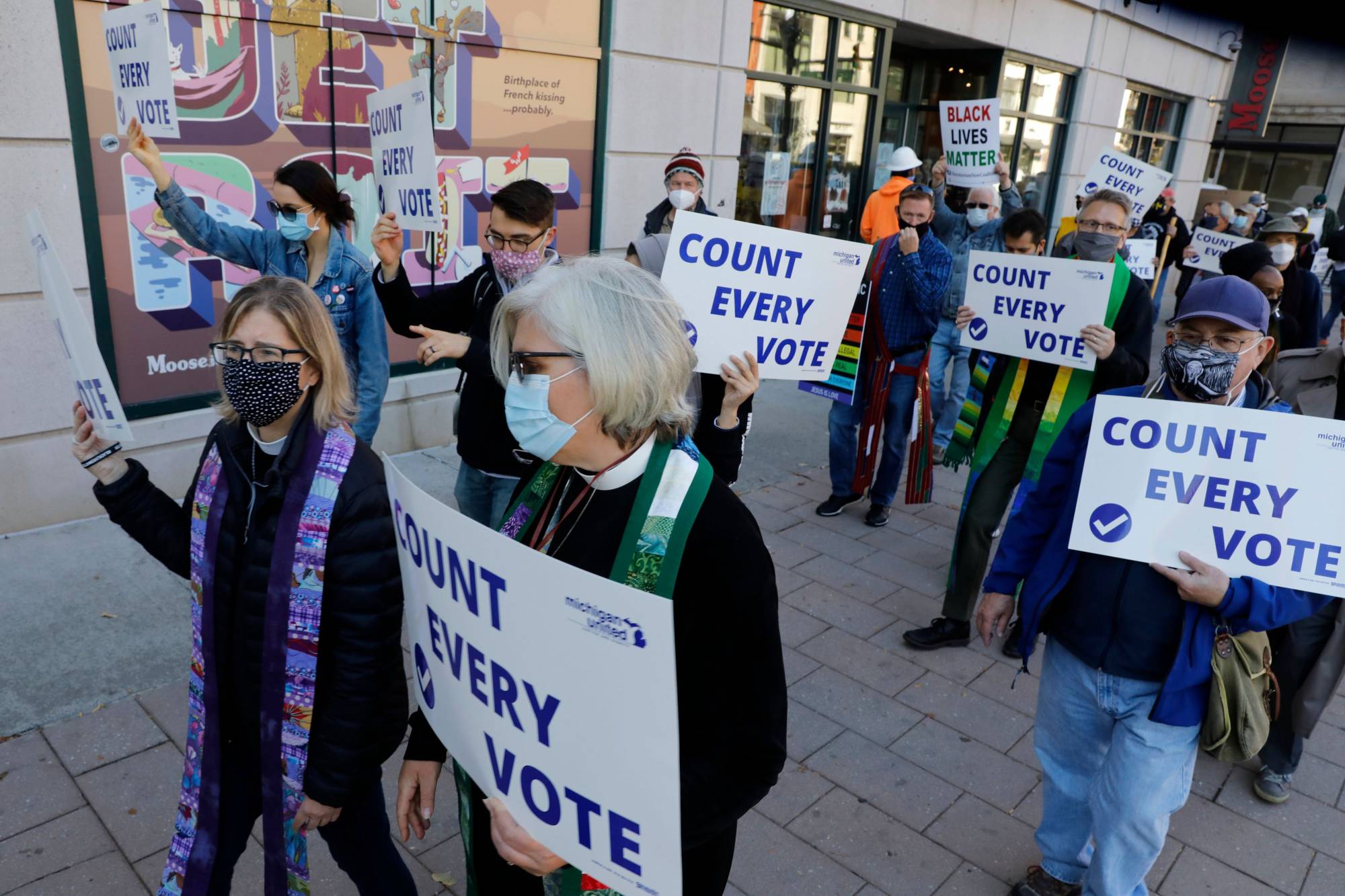 Protesters who want every vote counted from the 2020 U.S. presidential election march in Detroit on Wednesday. | AFP-JIJI