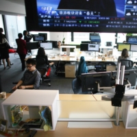 The New York newsroom of Xinhua News Agency, the official Chinese news outlet, in May 2011, shortly after it opened.  | CHANG W. LEE / THE NEW YORK TIMES