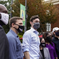 Jon Ossoff, center, the Democratic candidate for Senate running against Senator David Perdue, in Athens, Georgia, on Oct. 26 | NICOLE CRAINE / THE NEW YORK TIMES