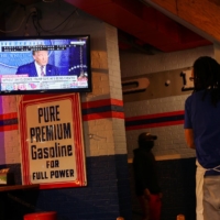 A TV screen at a restaurant shows U.S. President Donald Trump speaking after Election Day in Washington on Thursday. | REUTERS