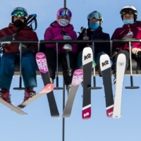 Skiers ride a chairlift on the opening day of the Verbier ski area in the Swiss Alps on Oct. 30.  | KEYSTONE / VIA AP
