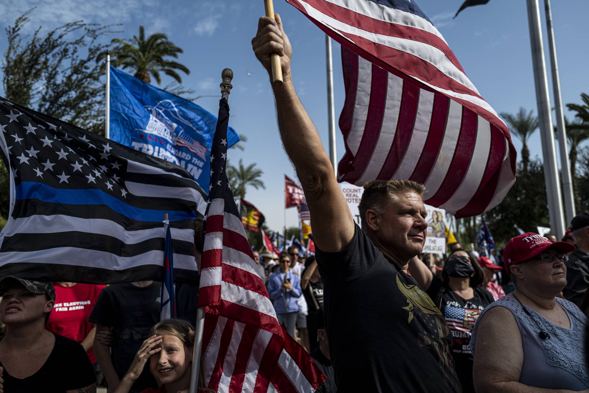 Trump supporters gather in Phoenix on Saturday. | Adriana Zehbrauskas / The New York Times