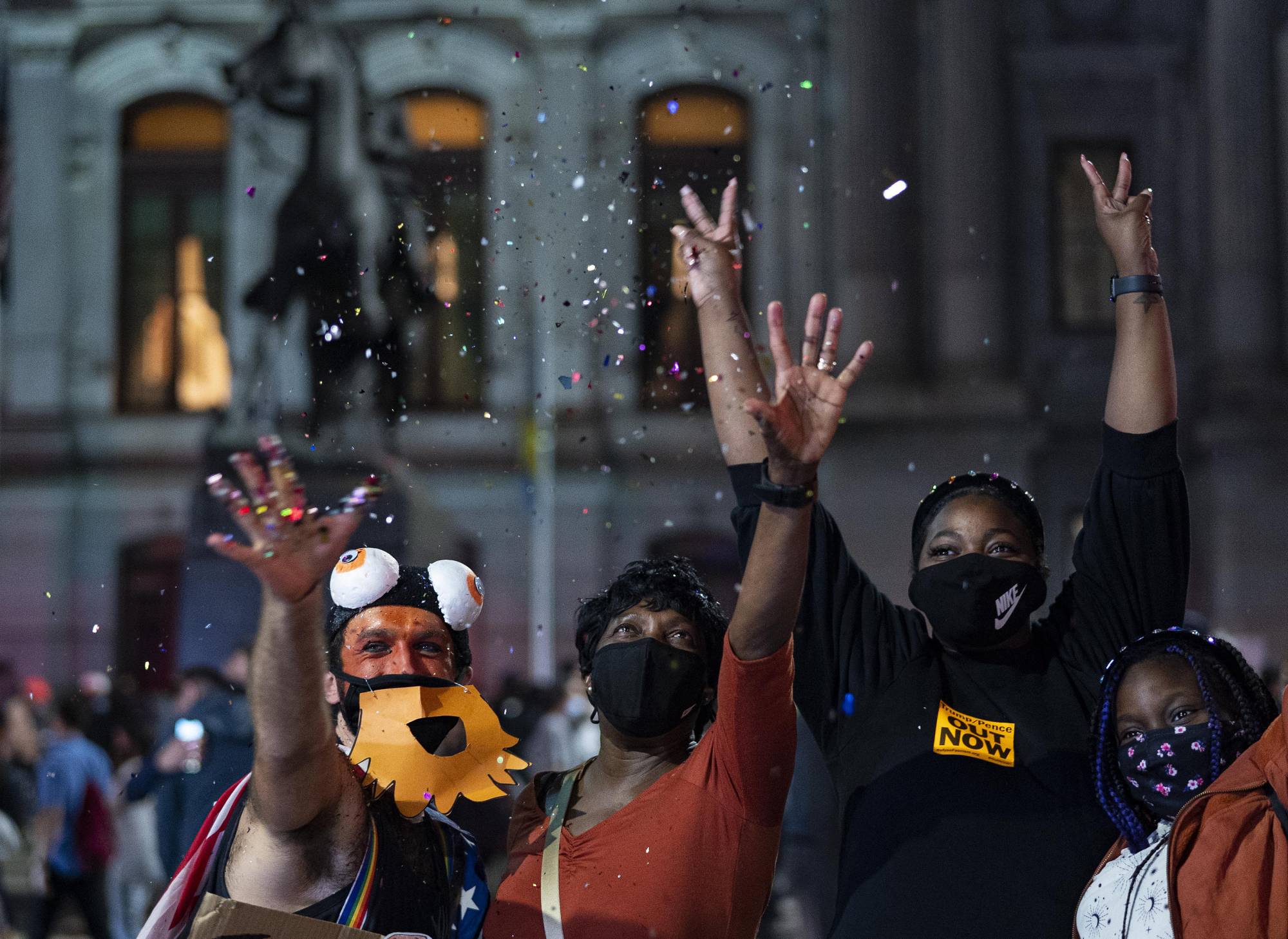 Biden supporters celebrate in the street in Philadelphia on Saturday. | Ruth Fremson / The New York Times