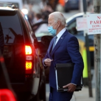 U.S. President-elect Joe Biden leaves a meeting on the first day of his transition in Wilmington, Delaware, on Monday. | REUTERS 