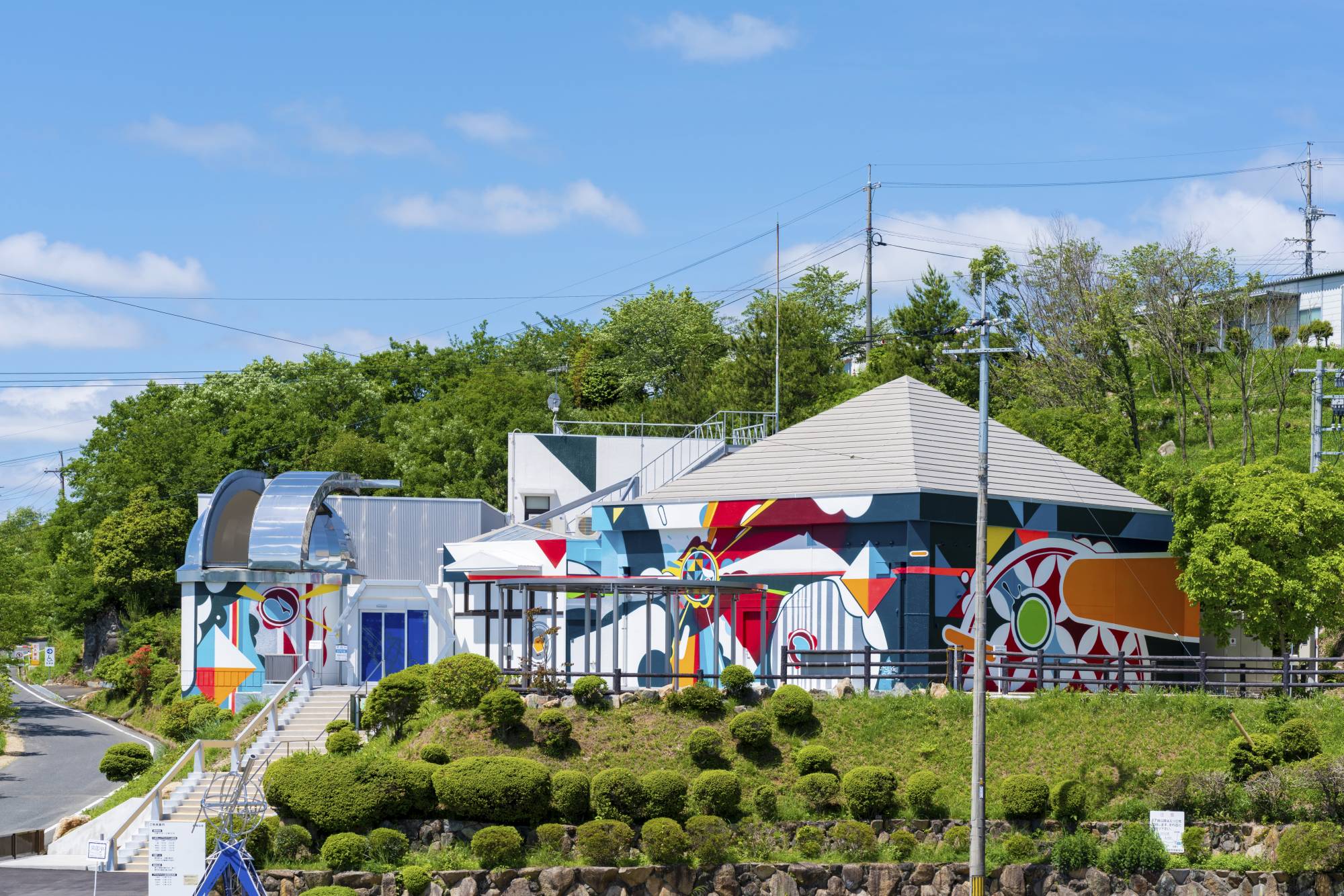 Mural artist and THA collective member Suiko painted the entire exterior of the Okayama Astronomical Museum. | ITTOKU KAWASAKI / COURTESY OF THA 