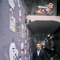 Shibuya Mayor Ken Hasebe stands beside one of the pieces commissioned by the local authority as part of the Shibuya Arrow Project. | STEPHAN JARVIS
