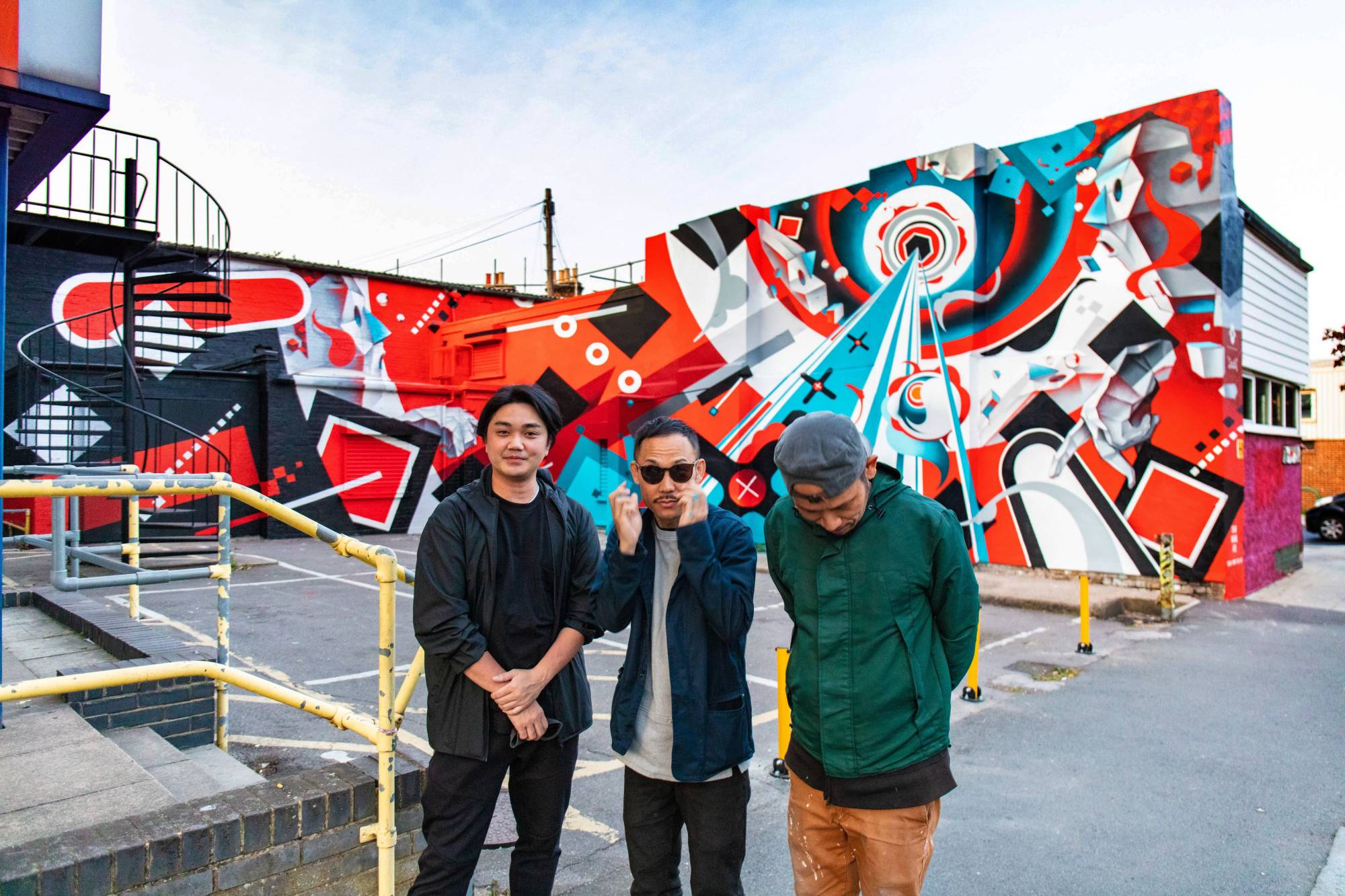 Japanese mural artists (from left) Fate, Suiko and Imaone took part in the inaugural London Mural Festival in September, painting a wall in the city’s Peckham area. | YUTA NAOUMI / COURTESY OF THA