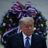 U.S. President Donald Trump attends a remembrance ceremony for war veterans on Wednesday in Arlington, Virginia.  | AFP-JIJI