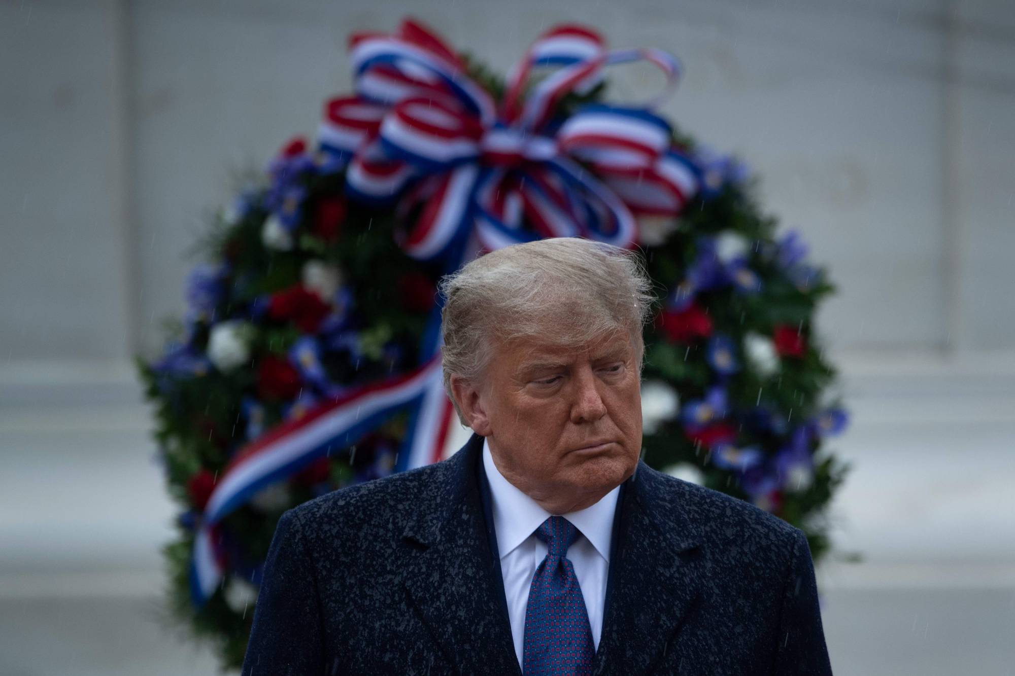U.S. President Donald Trump attends a remembrance ceremony for war veterans on Wednesday in Arlington, Virginia. | AFP-JIJI
