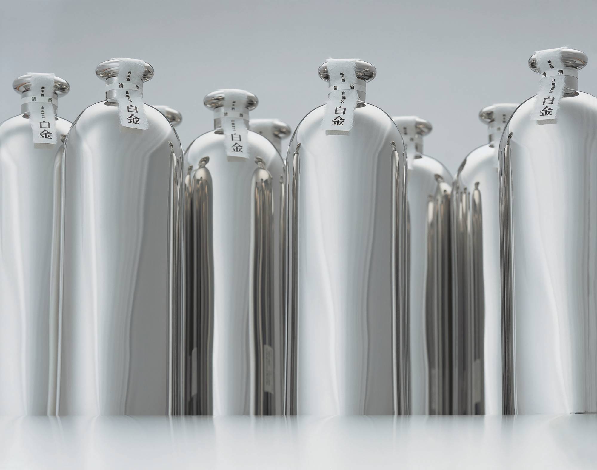Platinum plan: The Hara Design Institute created stainless steel bottles that reflect their surroundings for Nagano-based Obuse-do brewery’s Hakkin (Platinum) sake.