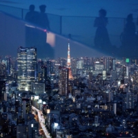 Japan’s biggest banks on Friday warned of a bleaker outlook for the next six months as the resurgent pandemic slams economies.  | AFP-JIJI / VIA GETTY IMAGES / VIA BLOOMBERG
